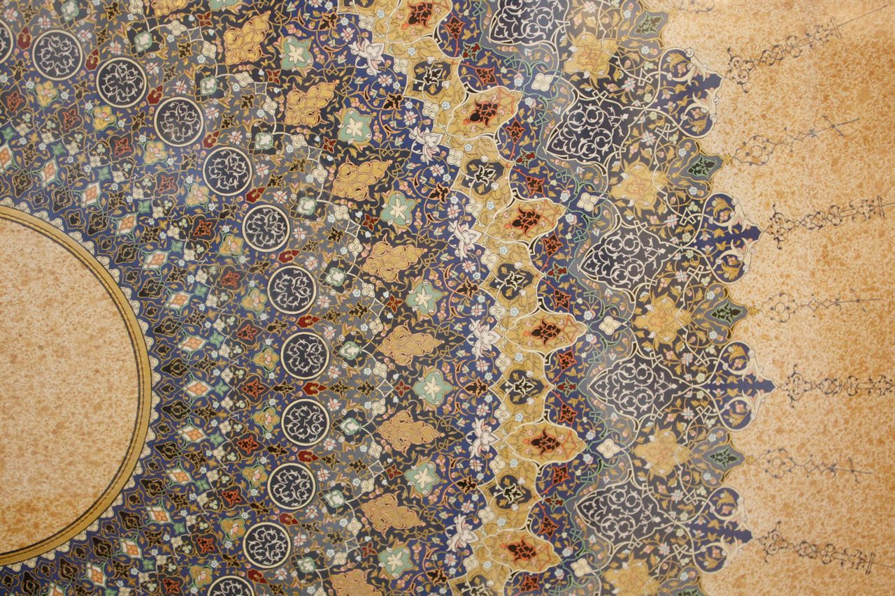 Persian ornamental pattern with floral arabesques in gold and blue