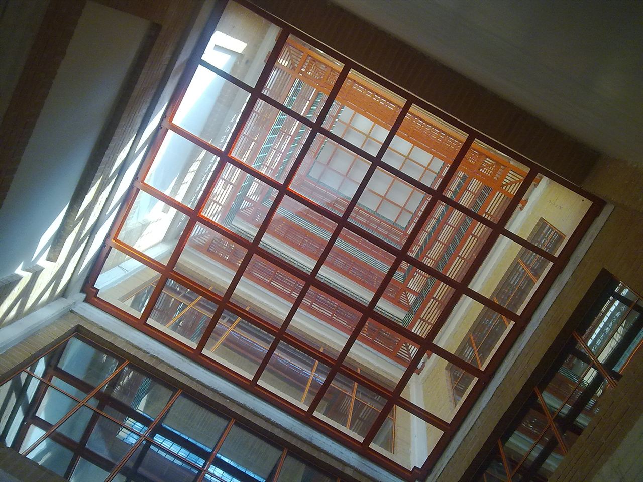 Looking up through a gridded skylight